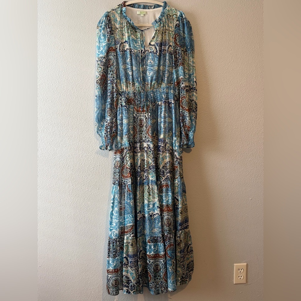 JADE MELODY TAM 

Printed Tie Neck Long Sleeve Maxi Dress